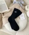 Czarny z haftowanymi oczami Ciepłe skarpetki z wełna królicza z haftowanymi oczami - One size