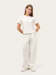 Mleczne spodnie wide leg z dzianiny trzy-nitkowej