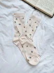 Półprzezroczyste damskie skarpetki w kwiatuszki - One size
