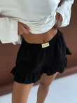 Czarne szorty z falbanami z bawełnianej tkaniny