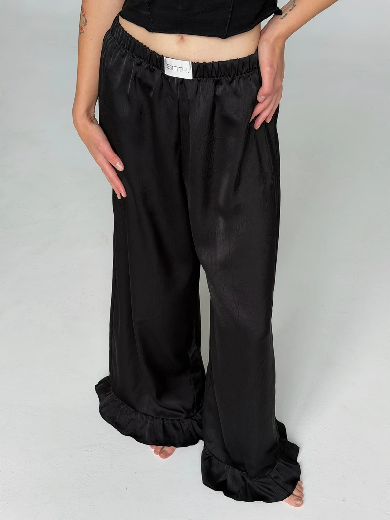 Spodnie z falbankami ze sztucznego jedwabiu (poliester)